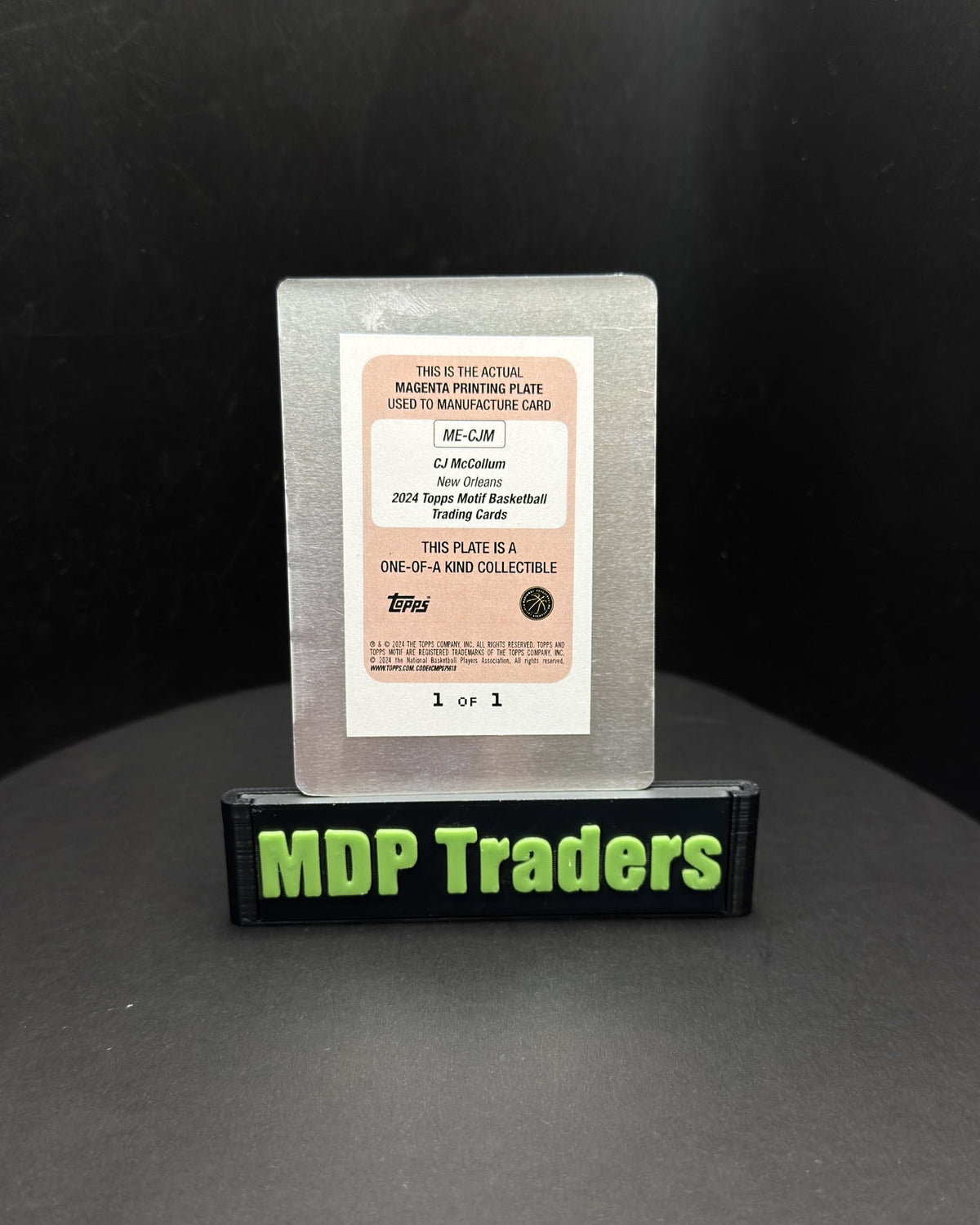 2023-24 Topps Motif CJ McCollum Motif Endorsements Magenta Printing Plate Auto #ME-CJM 1/1 - display back