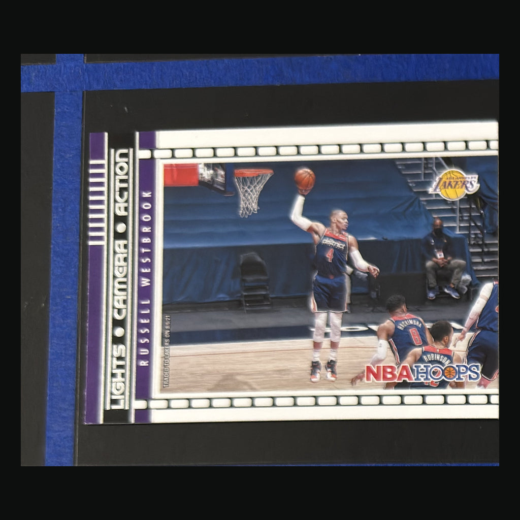 2021-22 Panini NBA Hoops Lights Camera Action Russell Westbrook #22 — front view