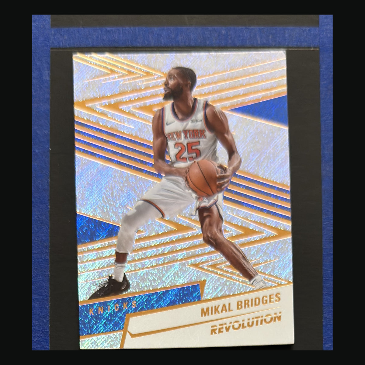 Front of 2024-25 Panini Revolution Mikal Bridges #25