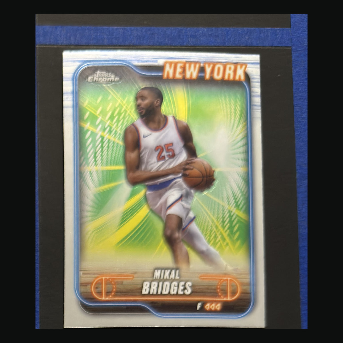 Front of 2024-25 Topps Chrome Green Geometric Refractor Mikal Bridges #190