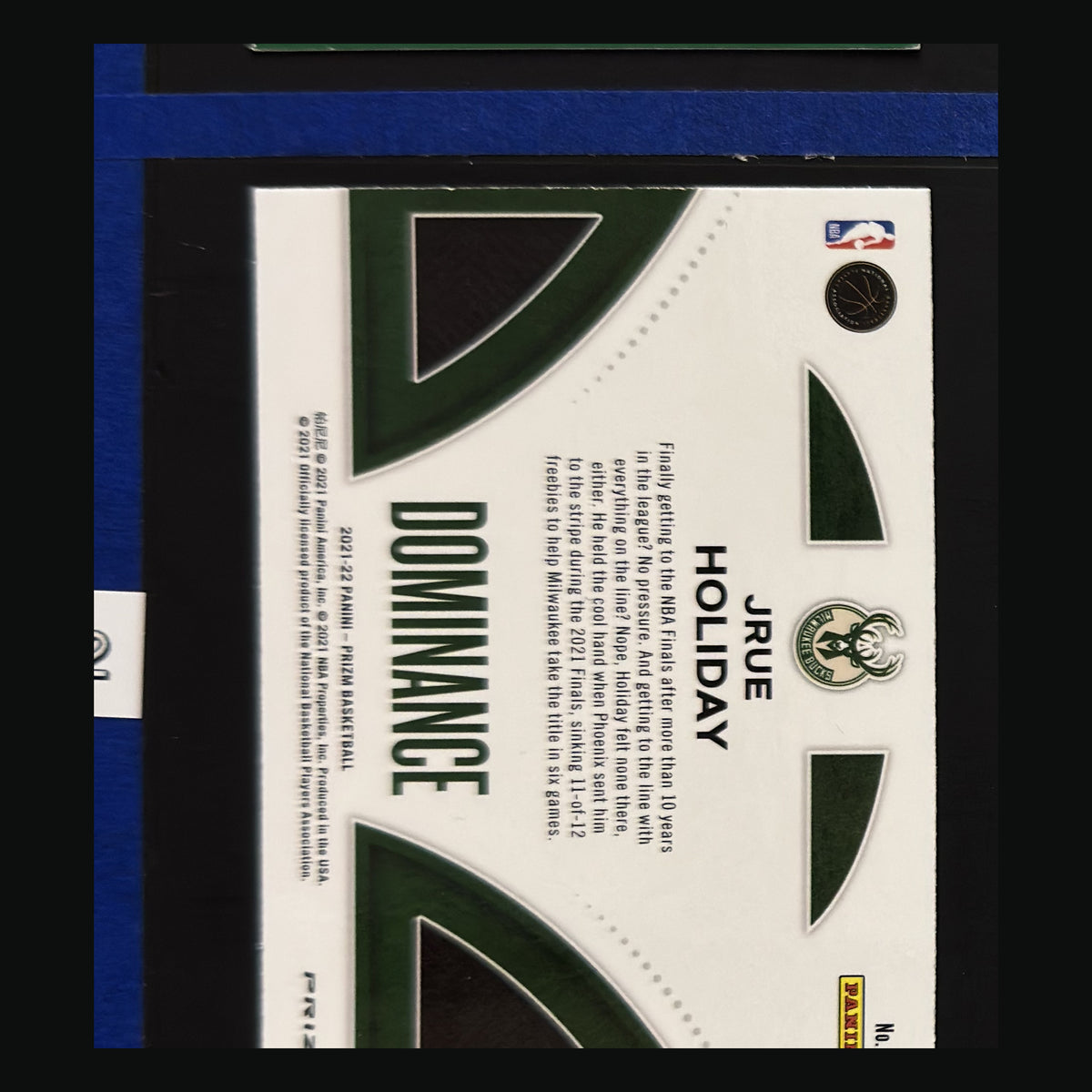 2021-22 Panini Prizm Dominance Green Prizm Jrue Holiday #19 — back