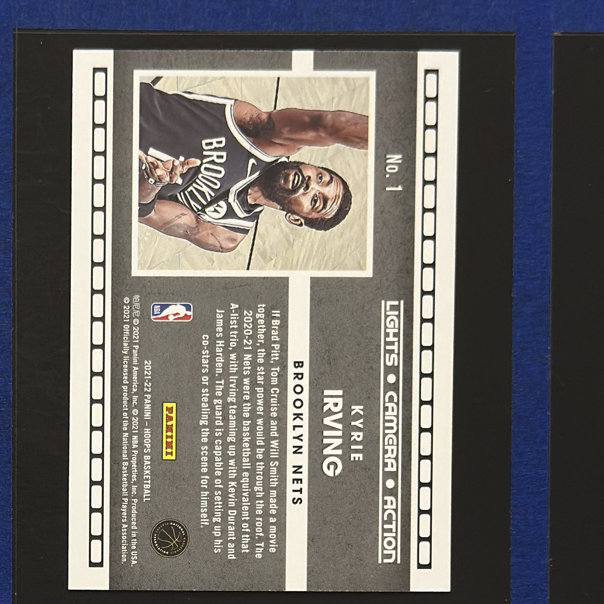 2021-22 Panini NBA Hoops Lights Camera Action Kyrie Irving #1 — back view
