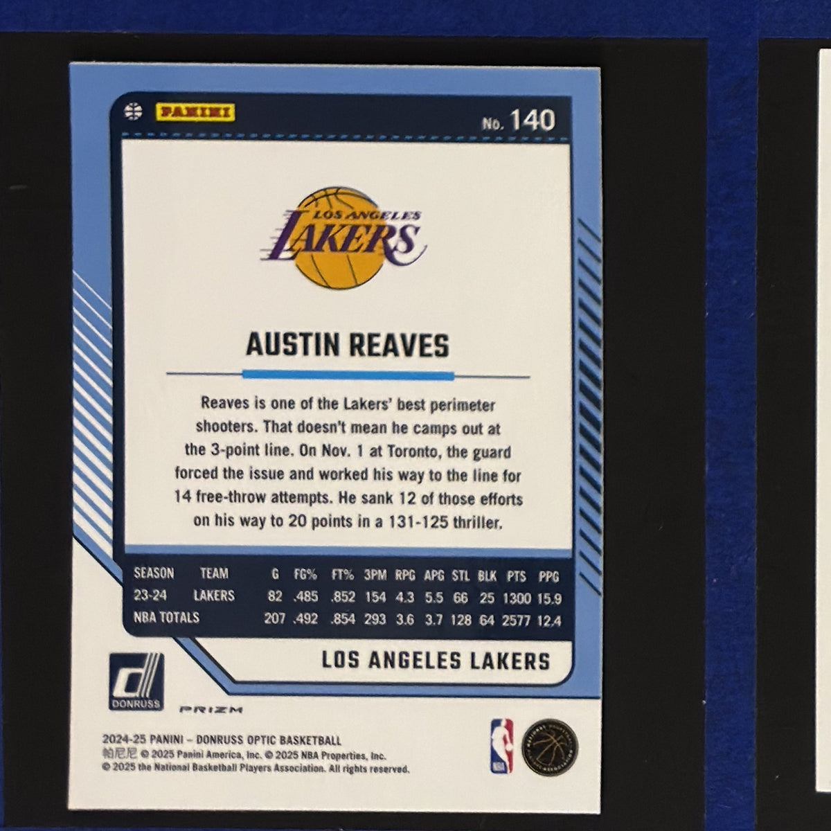 2024-25 Panini Donruss Optic Blue Velocity Prizm Austin Reaves #140 — back view