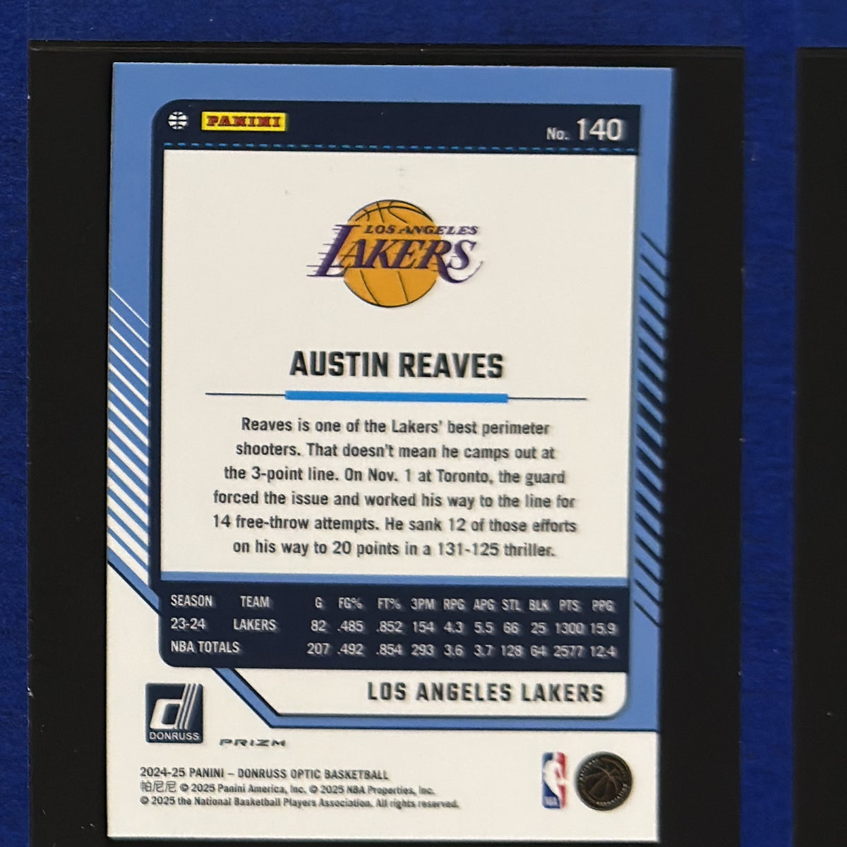2024-25 Panini Donruss Optic Purple Prizm Austin Reaves #140 — back view