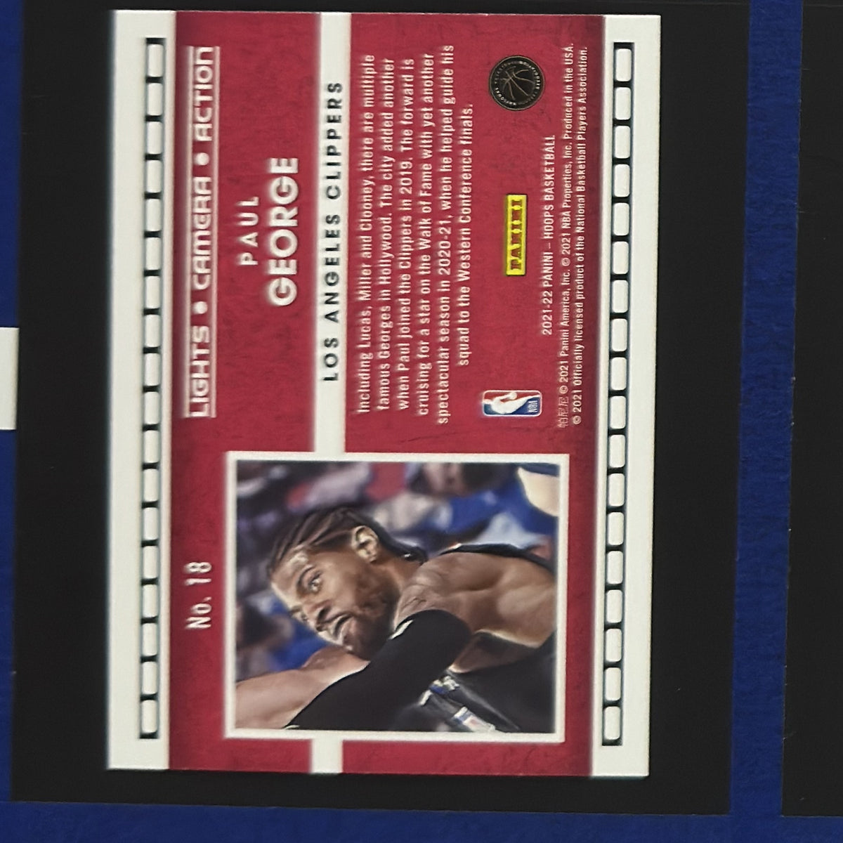2021-22 Panini NBA Hoops Lights Camera Action Paul George #18 — back view