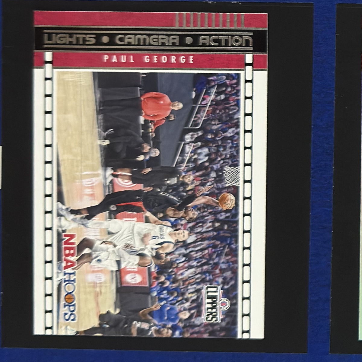 2021-22 Panini NBA Hoops Lights Camera Action Paul George #18 — front view