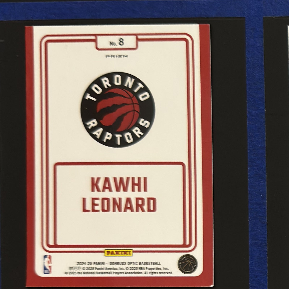 2024-25 Panini Donruss Optic Winner Stays Purple Prizm Kawhi Leonard #8 — back view