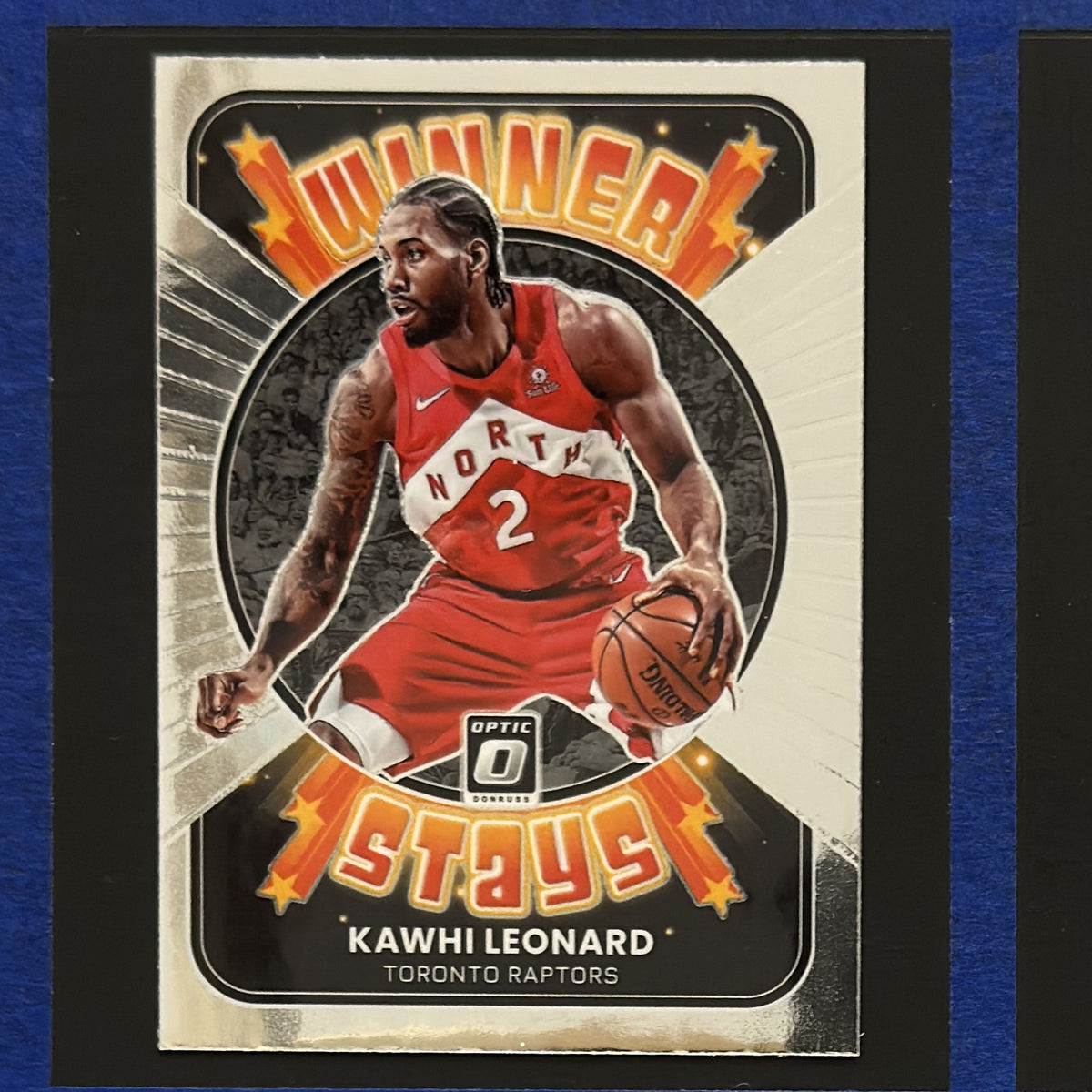 2021-22 Panini Donruss Optic Winner Stays Kawhi Leonard #18 — front view