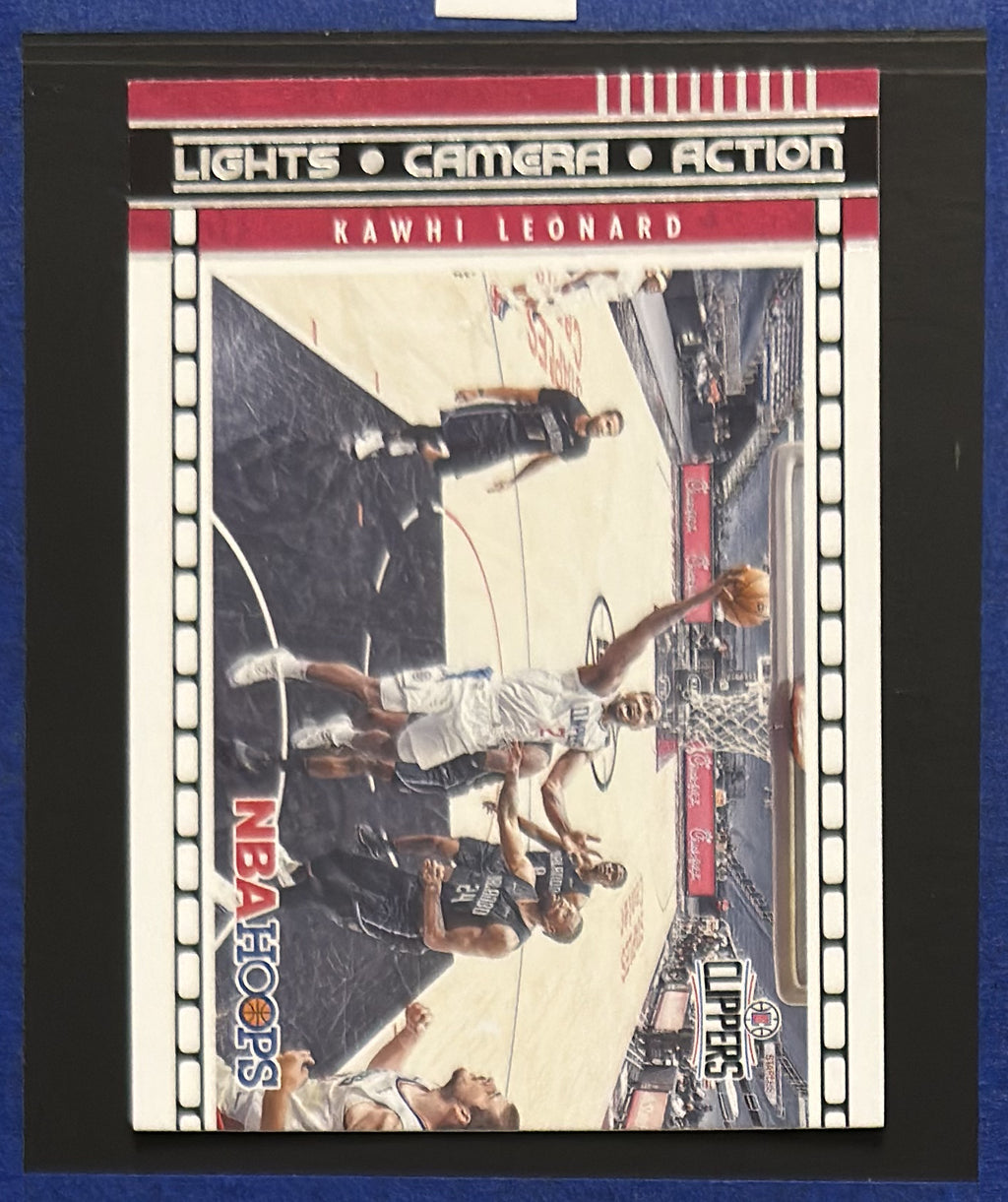 2021-22 Panini NBA Hoops Lights Camera Action Kawhi Leonard #8 — front view