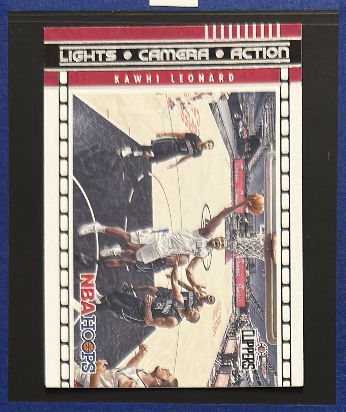 2021-22 Panini NBA Hoops Lights Camera Action Kawhi Leonard #8 — front view
